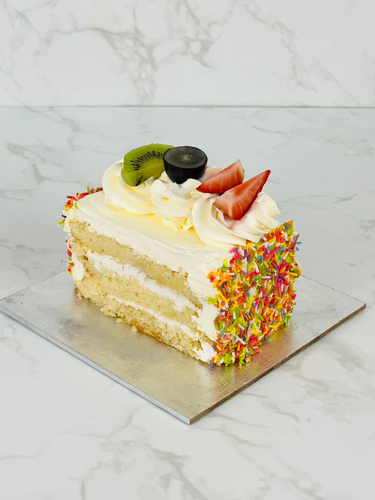 Vanilla Cream with Sprinkles Cake Slice