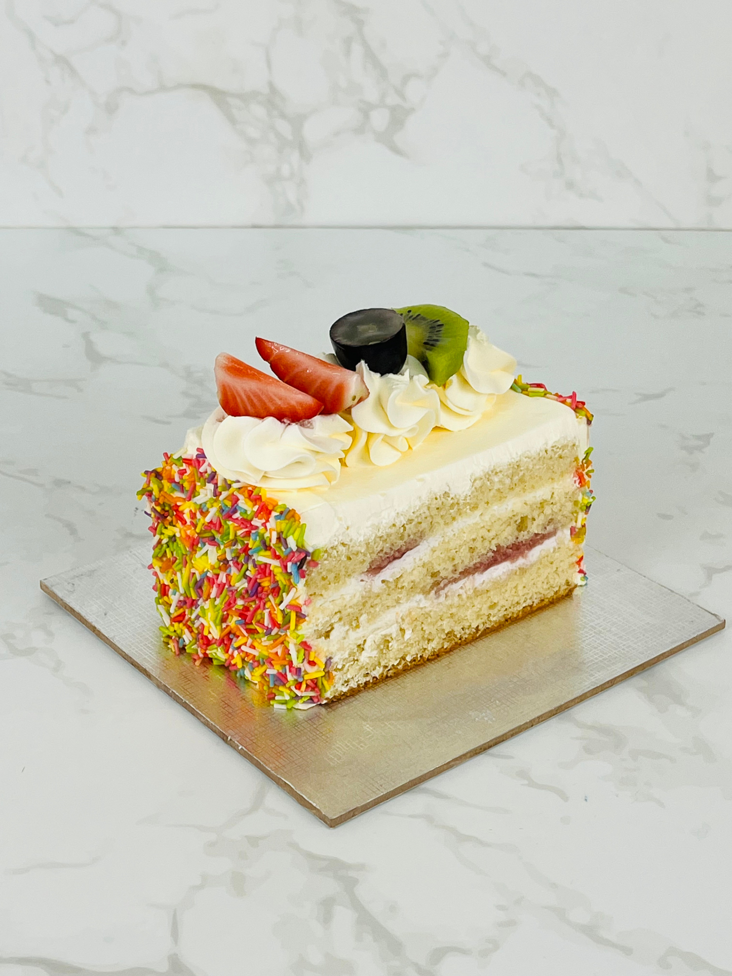 Vanilla Cream with Sprinkles Cake Slice