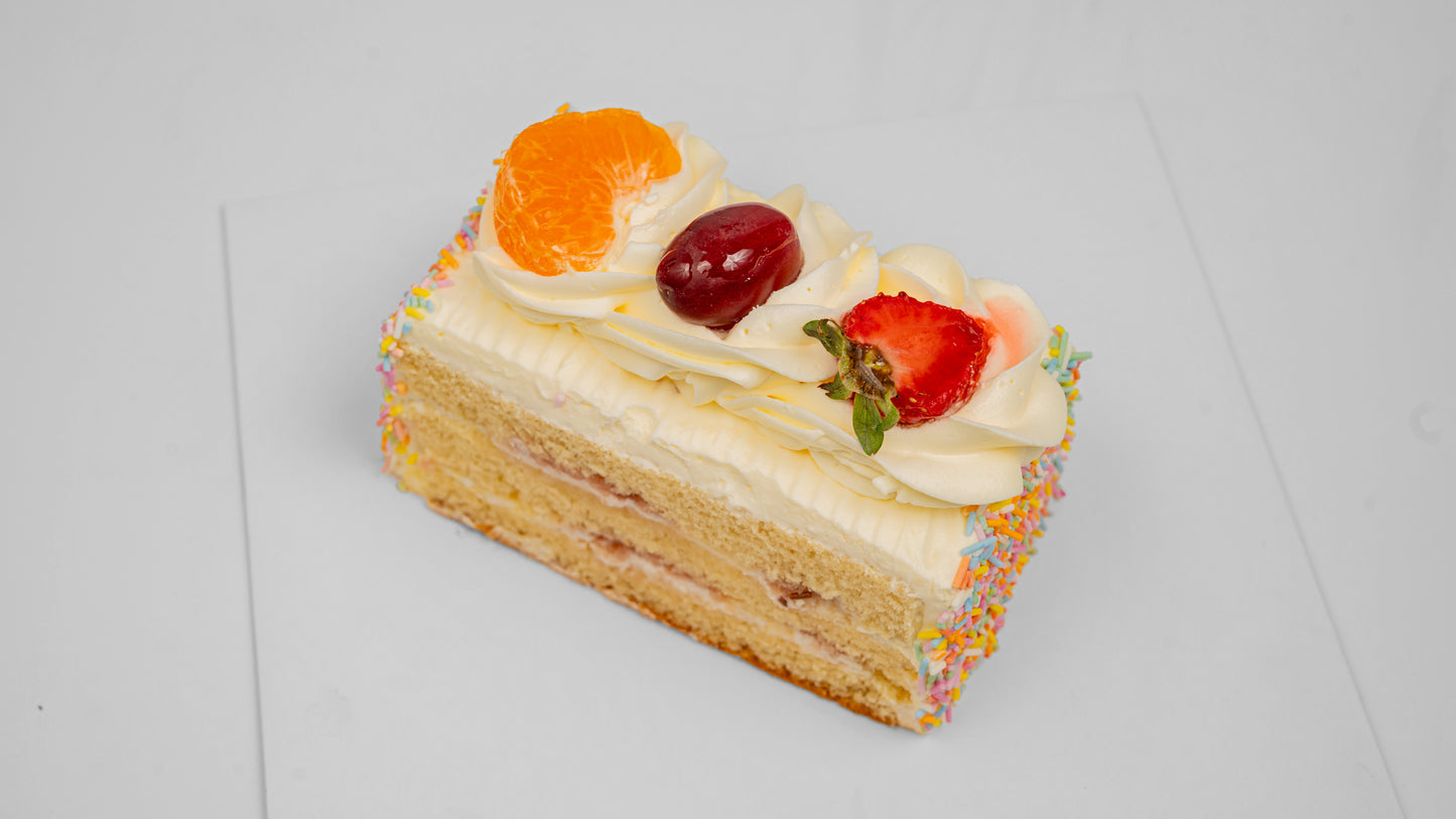 Vanilla Cream with Sprinkles Cake Slice